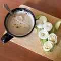 breakfast with mug chicory with milk and avocado sandwich