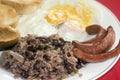 Breakfast in Nicaragua gallo pinto eggs sausage Royalty Free Stock Photo