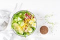 Breakfast oatmeal porridge with fresh vegetable salad of cucumber, radish, lettuce, corn, avocado, chia seeds and boiled eggs Royalty Free Stock Photo