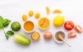 Breakfast with orange juice, oranges, oranges slice, passion fruit , ginger,tomato and Kiwi set up on wooden table . Royalty Free Stock Photo