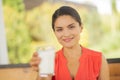 Pretty businesswoman enjoying weekend and breakfast outside