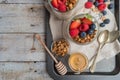 Breakfast parfait with homemade granola, fresh fruits and yogurt Royalty Free Stock Photo