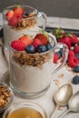 Breakfast parfait with homemade granola, fresh fruits and yogurt Royalty Free Stock Photo