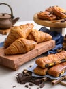 Breakfast pastries of croissant, cinnamon buns and raisin danish Royalty Free Stock Photo