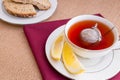 Breakfast with pastries, and hot tea with lemon. Royalty Free Stock Photo