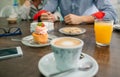 Breakfast with couple holding hands Royalty Free Stock Photo
