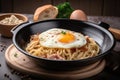 breakfast plate, filled with piping hot carbonara and fried eggs Royalty Free Stock Photo