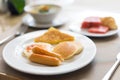 Breakfast plate with pancakes and egg fried with fruit Royalty Free Stock Photo