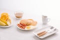 Breakfast plate with pancakes, eggs, bacon and fruit. Royalty Free Stock Photo