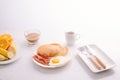 Breakfast plate with pancakes, eggs, bacon and fruit. Royalty Free Stock Photo