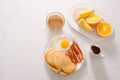 Breakfast plate with pancakes, eggs, bacon and fruit. Royalty Free Stock Photo