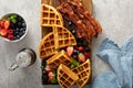 Breakfast platter with waffles, berries and bacon Royalty Free Stock Photo