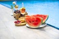 Breakfast by the pool. Watermelon, berries, croissants, non-alcoholic cocktails by the pool