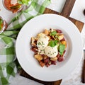 Breakfast potatoes with eggs Benedict and beef Royalty Free Stock Photo