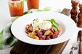 Breakfast potatoes with eggs Benedict and beef Royalty Free Stock Photo