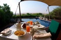 Breakfast on a private pool in the desert Royalty Free Stock Photo