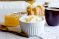 breakfast with ricotta or cottage cheese with honey and nuts Royalty Free Stock Photo