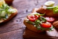 Breakfast sandwich with homemade paste, vegetables and fresh greens, shallow depth of field Royalty Free Stock Photo