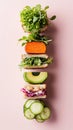 A breakfast sandwich stack showcases an array of fresh vegetables layered between slices of whole grain bread, arranged Royalty Free Stock Photo