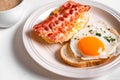 Breakfast sandwiches with fried egg, bacon and scrumble Royalty Free Stock Photo