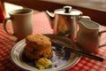 Breakfast Scone With Butter and Pot of Tea 