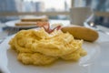 Breakfast with scrambled eggs, sausage and bacon Royalty Free Stock Photo