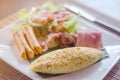 Breakfast with scrambled eggs, sausage links and Bacon Royalty Free Stock Photo