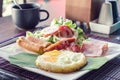 Breakfast with scrambled eggs, sausage links and toast. Royalty Free Stock Photo