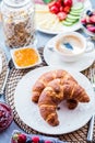 Breakfast served with coffee, orange juice and croissants Royalty Free Stock Photo