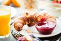 Breakfast served with coffee, orange juice and croissants Royalty Free Stock Photo