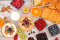 Breakfast Served in the morning with Butter bread and corn flakes Whole grains and raisins with milk in cups and Strawberry, Blueb Royalty Free Stock Photo