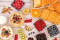 Breakfast Served in the morning with Butter bread and corn flakes Whole grains and raisins with milk in cups and Strawberry, Blueb Royalty Free Stock Photo