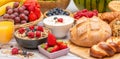 Breakfast Served in the morning with Butter croissant and corn flakes Whole grains and raisins with milk in cups and Strawberry, Royalty Free Stock Photo