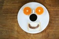 Breakfast serving funny face on the plate Royalty Free Stock Photo