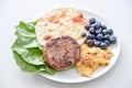 Breakfast set, Beef, Omelet, Blueberry, Vegetable, thin pancake Royalty Free Stock Photo