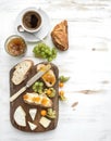 Breakfast set. Brie cheese and fig jam sandwiches Royalty Free Stock Photo