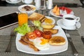 Breakfast set on the table with pancakes, bacon Royalty Free Stock Photo