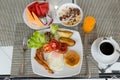 Breakfast set on the table with pancakes, bacon, eggs and coffee Royalty Free Stock Photo