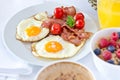 Breakfast setting with fried eggs. Royalty Free Stock Photo