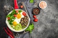 Breakfast skillet pan of fried egg, avocado and mushrooms. Ketogenic diet. Low carb high fat breakfast. Healthy food concept. Royalty Free Stock Photo