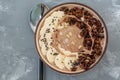 Breakfast smoothie bowl topped with chocolate