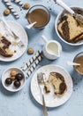 Breakfast or snack table - coffee, cookies, candy, cake, cream on a blue background Royalty Free Stock Photo