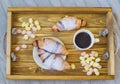 Breakfast still life with coffee and croissants