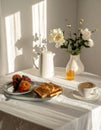 Breakfast Still Life with Coffee Fruit Flowers and Toast Under Sunlight Royalty Free Stock Photo