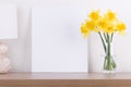 Breakfast still life., empty picture frame mockup on wooden desk, table. . Elegant working space, home office concept. Scandinavia Royalty Free Stock Photo