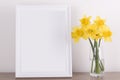 Breakfast still life., empty picture frame mockup on wooden desk, table. . Elegant working space, home office concept. Scandinavia