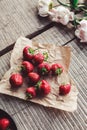 Breakfast with strawberries and flowers on the rustic table. Healthy breakfast, Royalty Free Stock Photo