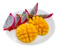 Breakfast with sweet pitaya and mango. Plate with pitaya and mango