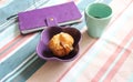 Breakfast with sweets, coffee and notebook Royalty Free Stock Photo