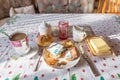 breakfast table with coffee sugar milk and butter and roll covered with euro coins and banknotes on plate, Germany Royalty Free Stock Photo